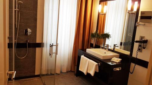 Koupelna v ubytování Best Western Plus Hotel StadtPalais