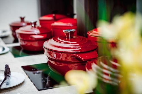 a red fire hydrant sitting on top of a table at Hotel Pushkin in Uralsk