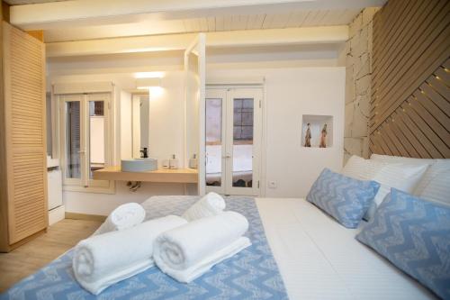 Кровать или кровати в номере Nine - Cozy Rooms