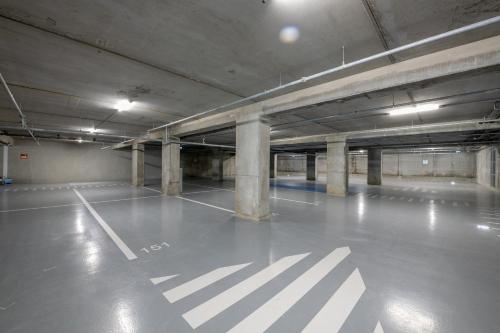 an empty parking lot in an empty parking garage at B&B HOTEL Bordeaux Centre Gare Saint-Jean in Bordeaux