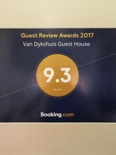 a sign that reads guest review awards van dyskus guest house at Van Dykshuis Guest House in Heidelberg