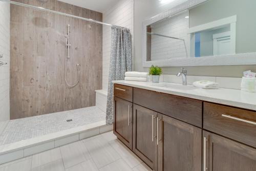 a bathroom with a sink and a shower at Johnson Street Studio in McMinnville