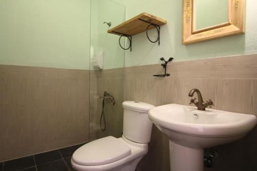 Ein Badezimmer in der Unterkunft 安堤卡
