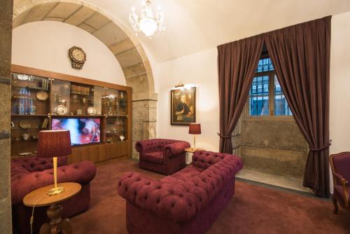TV a/nebo společenská místnost v ubytování Vila Gale Collection Braga