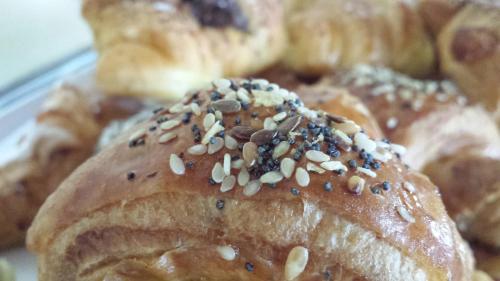 a close up of a pastry with sesame seeds on it at Hotel Firenze 2000 in Florence