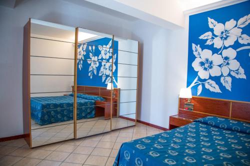 Postel nebo postele na pokoji v ubytování Assinos Palace Hotel