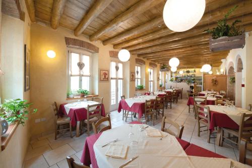 Restaurant ou autre lieu de restauration dans l'établissement Albergo Parigi