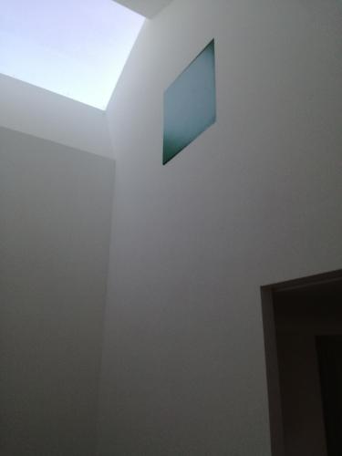 a room with a window on the wall at La casa di Mario tra le case in Ortona