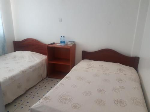 Katil atau katil-katil dalam bilik di Good Samaritan Inn