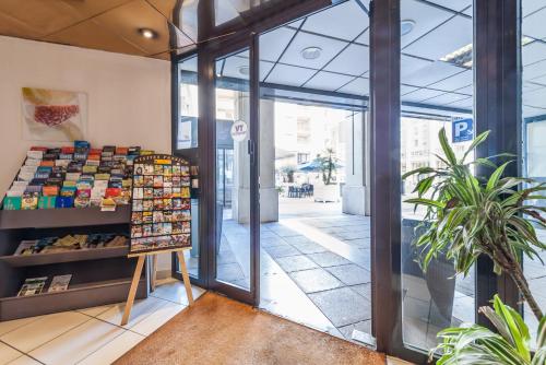 a store front with a display of products in a building at Residhotel Le Grand Prado in Marseille