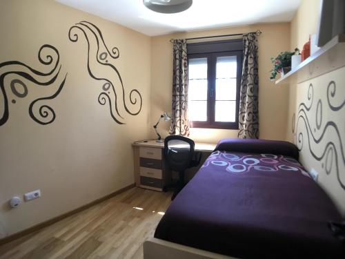 Postel nebo postele na pokoji v ubytování Casa El Cabrero