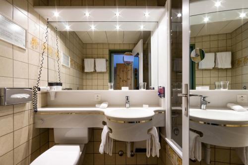 Koupelna v ubytování Hotel Astoria
