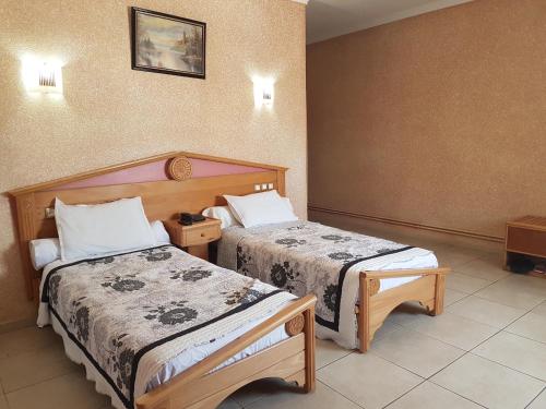 Postel nebo postele na pokoji v ubytování Charm El Cheikh Hotel