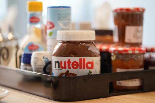 a bottle of nutella is sitting in a drawer at Amistad hotel in Amsterdam