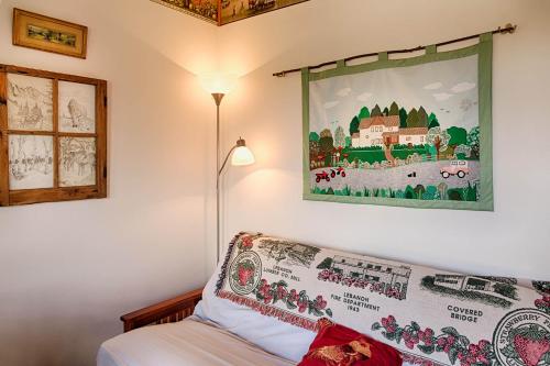 Ένα ή περισσότερα κρεβάτια σε δωμάτιο στο Highlander Cabin
