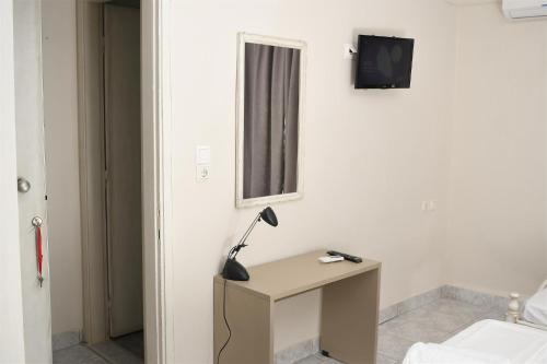 TV a/nebo společenská místnost v ubytování Villa Fallias