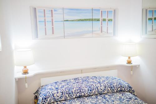 Cama o camas de una habitación en Mistral Residence