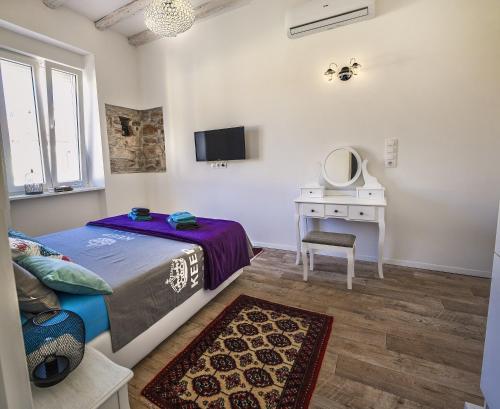 TV a/nebo společenská místnost v ubytování Emma's rooms B&B