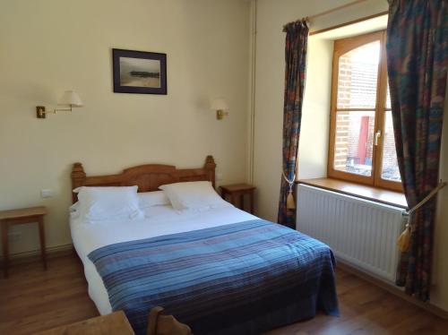 Postel nebo postele na pokoji v ubytování La Ferme de Mezoutre