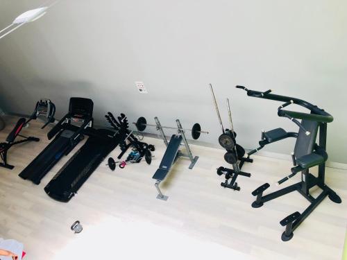 a room with a bunch of exercise equipment in it at Regency Torviscas Apartments and Suites in Adeje