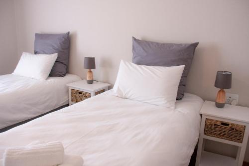 Katil atau katil-katil dalam bilik di Kramersdorf Guesthouse