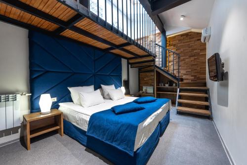 Кровать или кровати в номере Гостиница Парадная