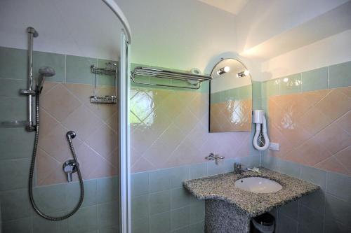 Koupelna v ubytování Hotel Cala Mirto