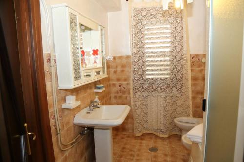 Koupelna v ubytování Arcobaleno