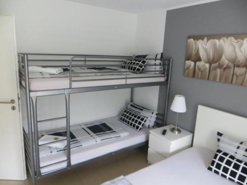 Ein Bett oder Betten in einem Zimmer der Unterkunft Ferienwohnung BELVEDERE