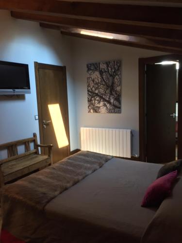 Postel nebo postele na pokoji v ubytování Posada Real Torre Berrueza