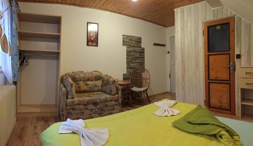 A bed or beds in a room at Privat Greta