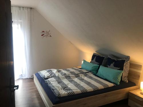 Katil atau katil-katil dalam bilik di Ferienwohnung am Komisenpad