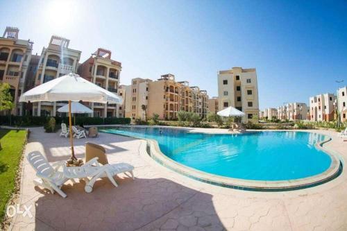 The swimming pool at or close to Emarat Hightes north coast egypt