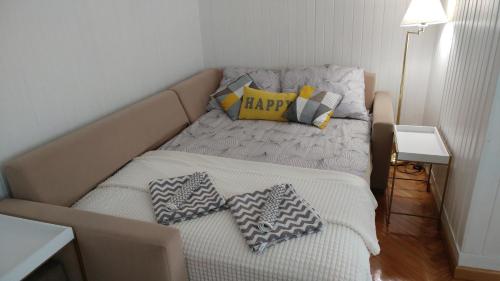 Katil atau katil-katil dalam bilik di Apartament Centrum