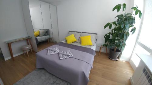 Katil atau katil-katil dalam bilik di Apartament Centrum