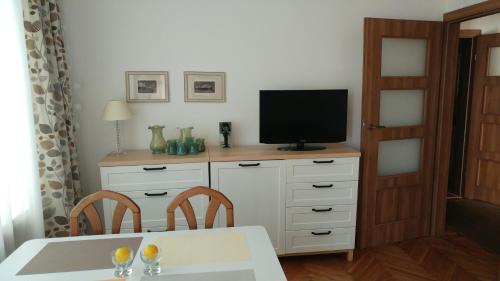 Televisyen dan/atau pusat hiburan di Apartament Centrum