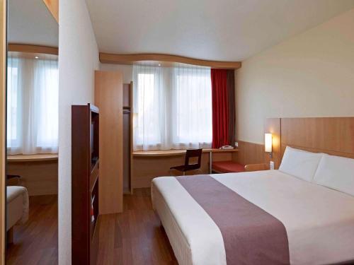 Katil atau katil-katil dalam bilik di Ibis Kraków Stare Miasto