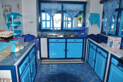 Kuchyň nebo kuchyňský kout v ubytování Le Chateau Bleu