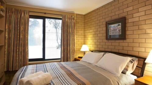 Ένα ή περισσότερα κρεβάτια σε δωμάτιο στο St Trinian's 3a