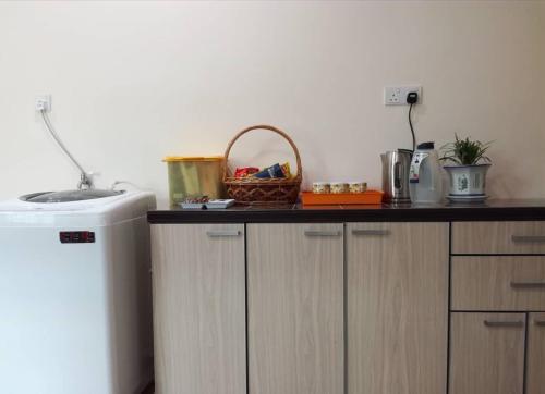 Η κουζίνα ή μικρή κουζίνα στο Kkp home stay