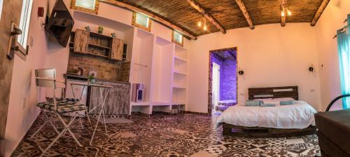 Cama o camas de una habitación en צימר old school