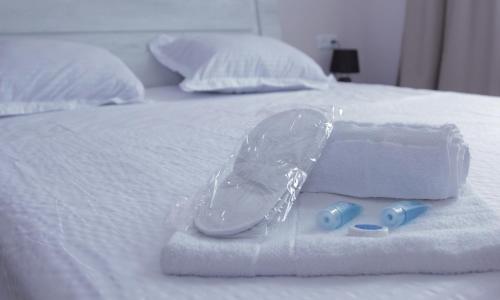 Llit o llits en una habitació de Hotel Caucasus
