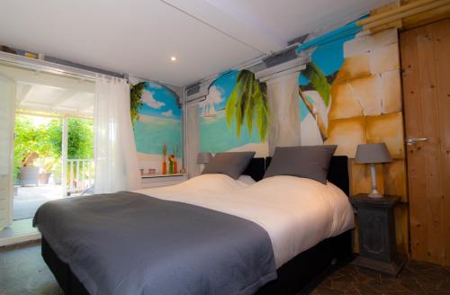 Postel nebo postele na pokoji v ubytování B&B Bed & Sauna