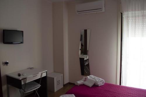 Katil atau katil-katil dalam bilik di Bed and Breakfast La Volpe Rossa