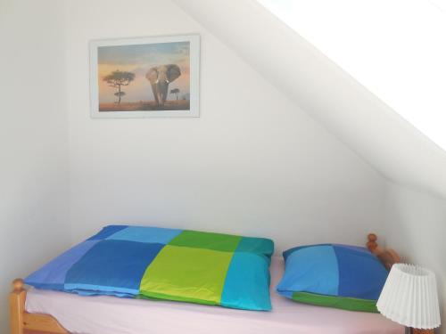 Giường trong phòng chung tại Erlebnisurlaub Laboe