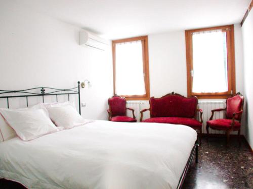 Ένα ή περισσότερα κρεβάτια σε δωμάτιο στο CA'Rialto