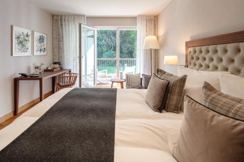 Postel nebo postele na pokoji v ubytování Waldhotel Stuttgart