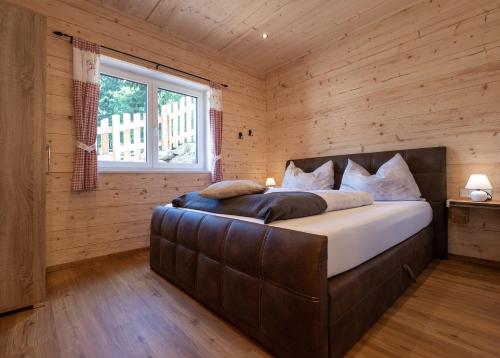 Llit o llits en una habitació de Schladminger Tauern Apartment