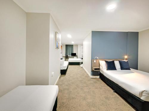 Katil atau katil-katil dalam bilik di 28 Hotel