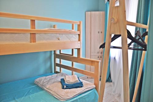 Llit o llits en una habitació de Dari apartament
